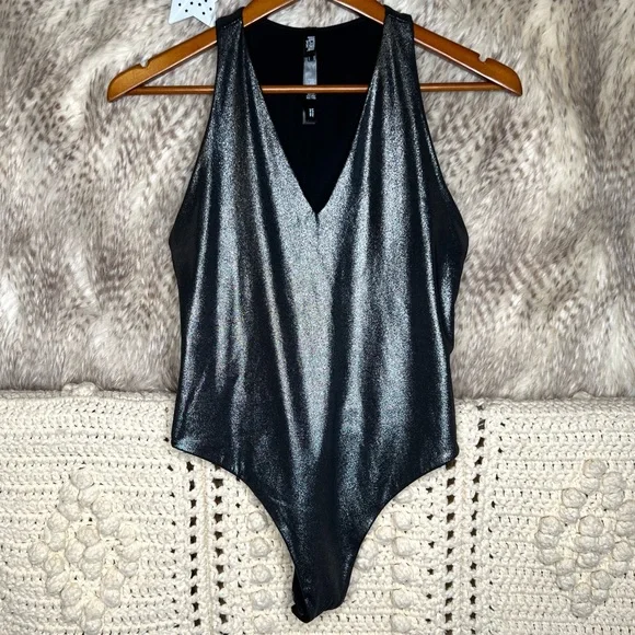 Nike rose best sale gold metallic bodysuit
